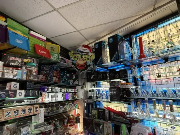 Stocked corner shelves inside Smoker's Alley on Gratiot Ave, Roseville, MI