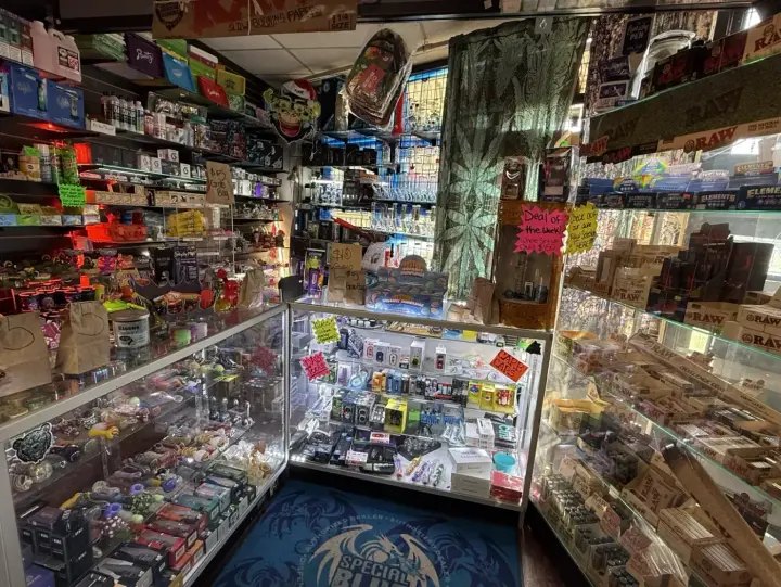 Glass counters and product wall inside Smoker's Alley, 27738 Gratiot Ave